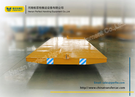 Yellow no - powered tow tailer for industrial assembly line with moving platform